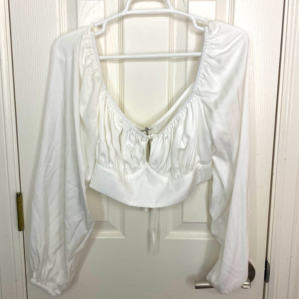 White top with zip up on the back